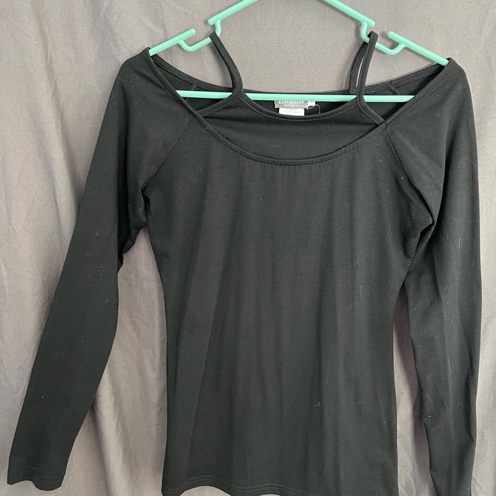 Cute black top, very stretchy. Like new.